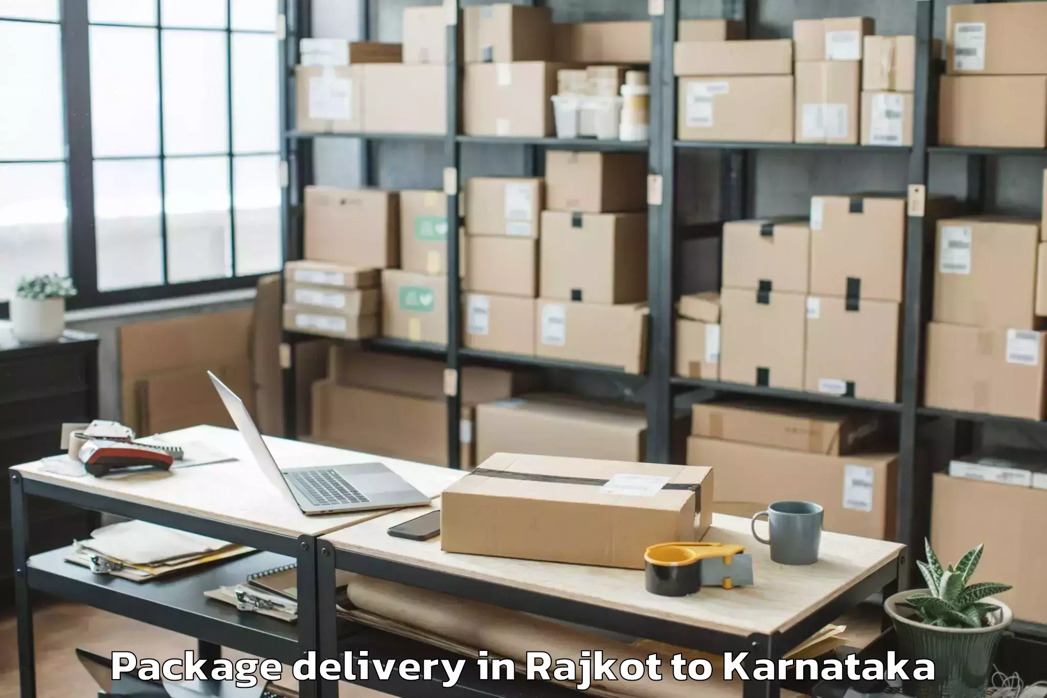 Reliable Rajkot to Kannada University Vidyaranya Package Delivery